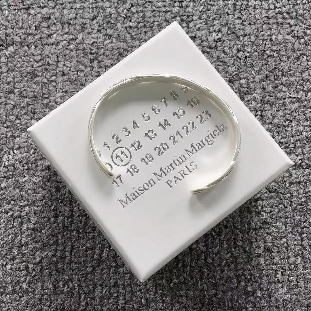 On Running 128 MAISON MARGIELA, photo 1