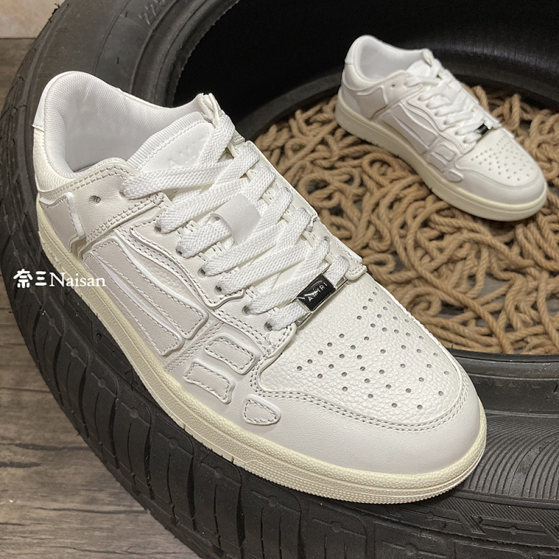 ▶ AMIRI Skel Top Low Sneakers, photo 1