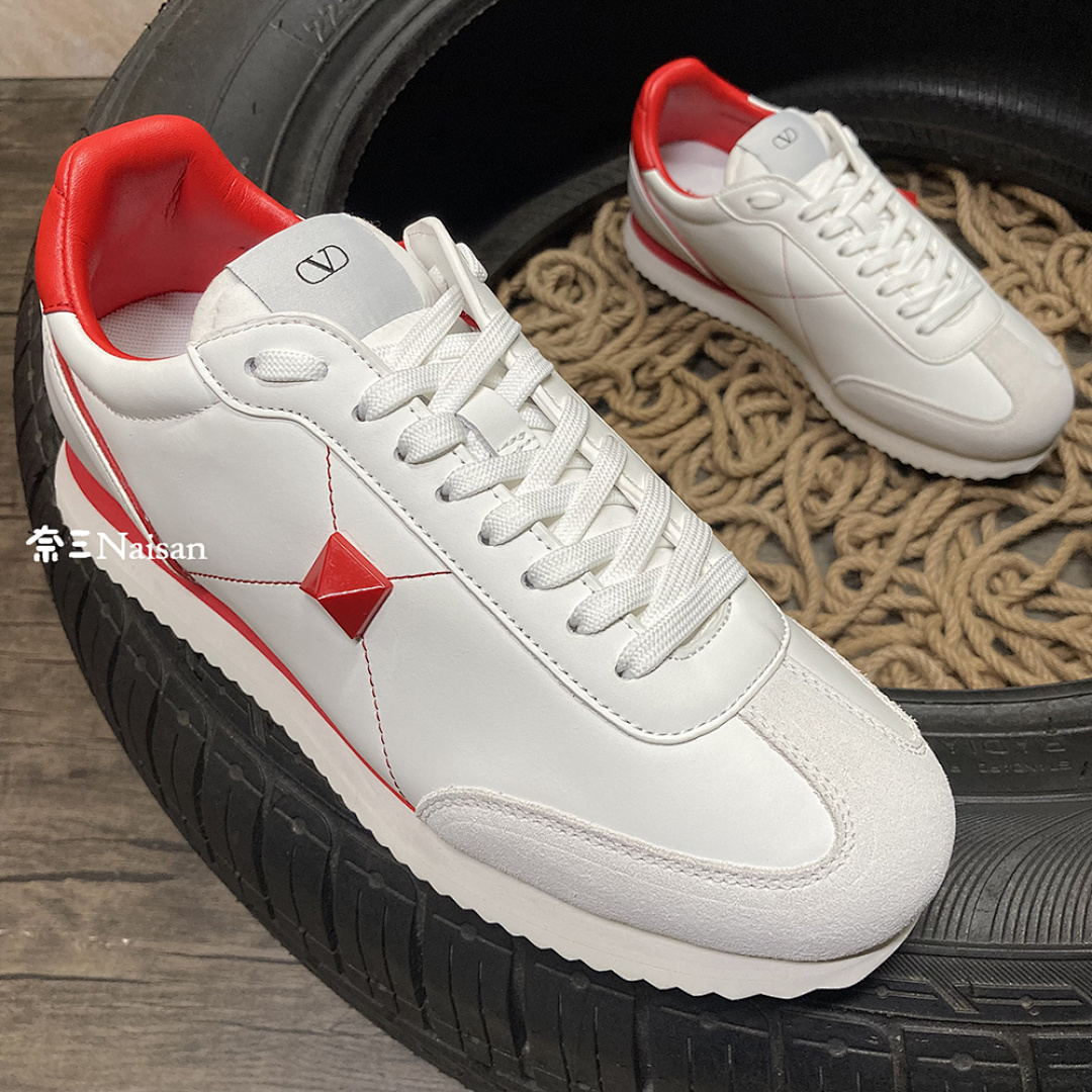 ▶ STUD AROUND LOW-TOP CALFSKIN AND NAPPA
