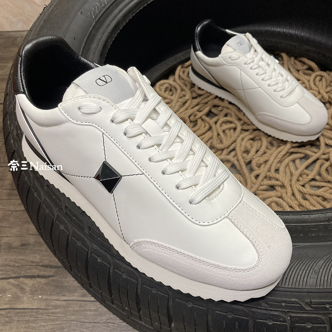 ▶ STUD AROUND LOW-TOP CALFSKIN AND NAPPA