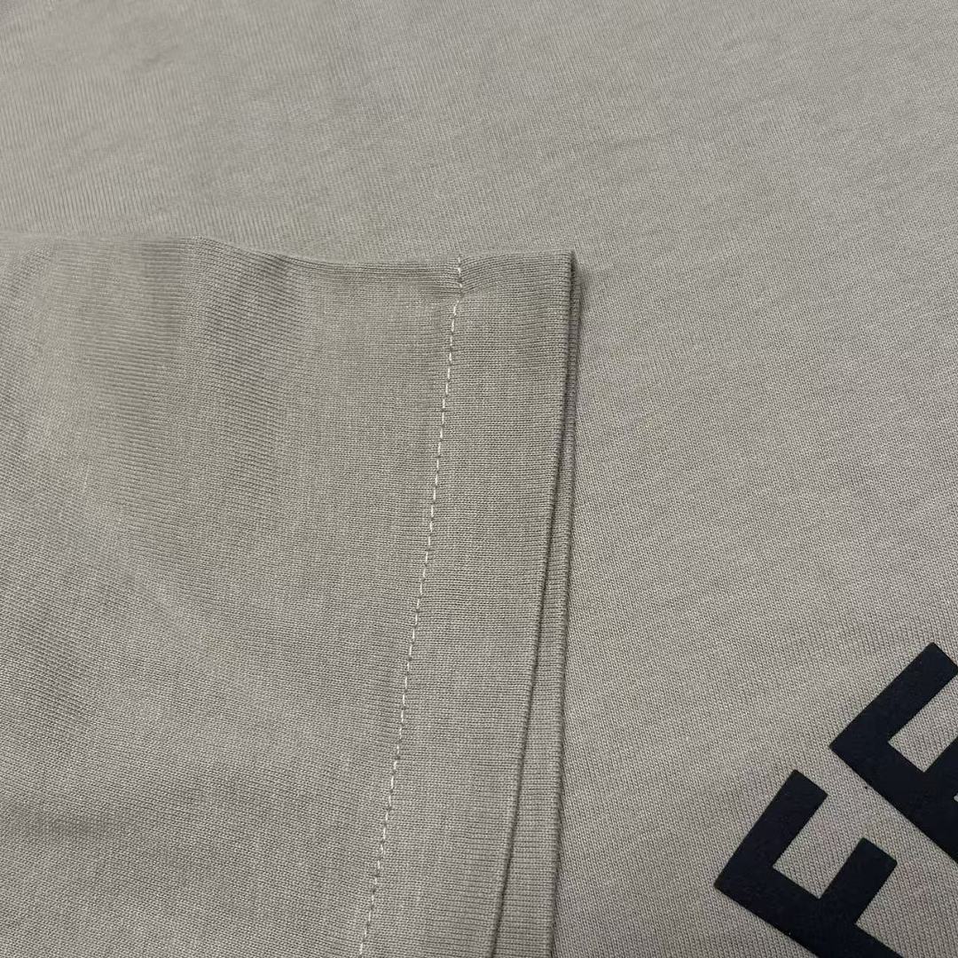 Essentials 128 Ess SS26 TRAINING Print Short Sleeve T Iron /FADED lRON GREY Sand DUNE SEAL : XS -XL - Image 17