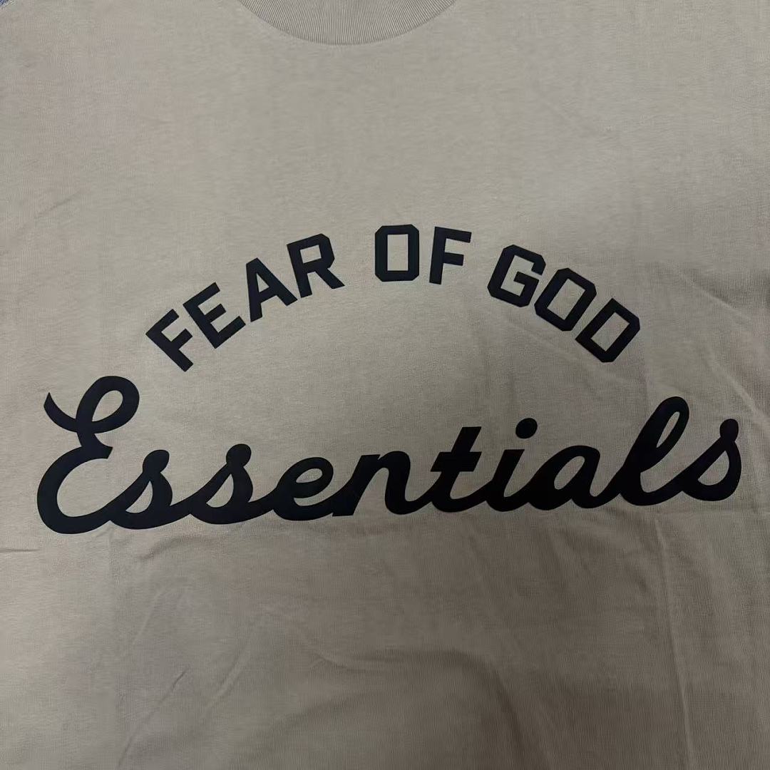 Essentials 128 Ess SS26 TRAINING Print Short Sleeve T Iron /FADED lRON GREY Sand DUNE SEAL : XS -XL - Image 20