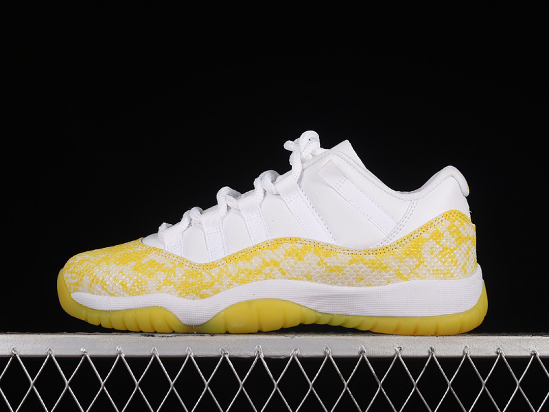 Jordan AIR Jordan 11 RETRO LOW YELLOW SNAKESKIN WHITE/TOUR YELLOW/SAIL · AH7860-107, photo 1