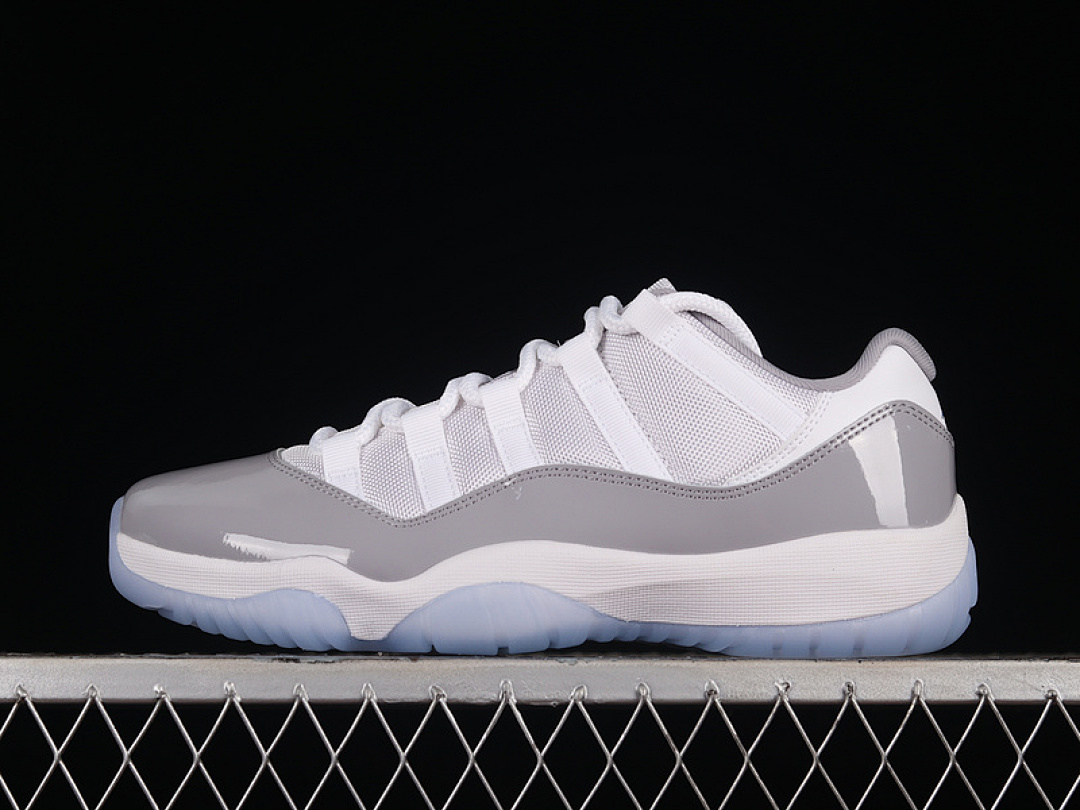 Jordan AIR Jordan 11 RETRO LOW WHITE/UNIVERSITY BLUE/CEMENT GREY · AV2187-140, photo 1