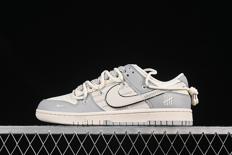 Nike SB DUNK LOW UN WHITE/GREY · DM6868-079, photo 1