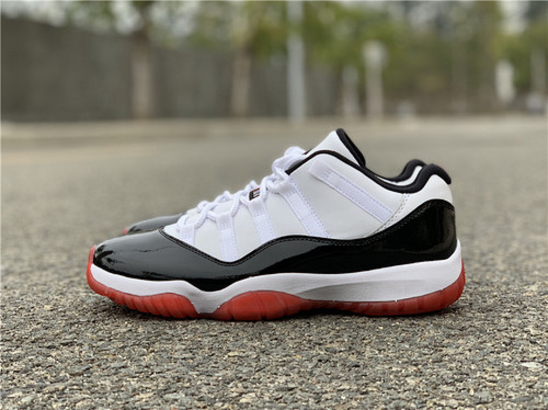 Jordan AIR Jordan 11 LOW WHITE/UNIVERSITY RED-BLACK-TRUE RED · AV2187-160, photo 1