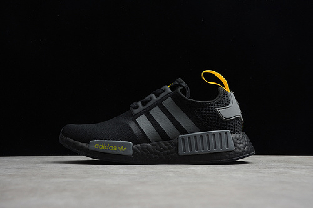 NMD R1 SHOES CORE BLACK/CORE BLACK/YELLOW · B8303, photo 1