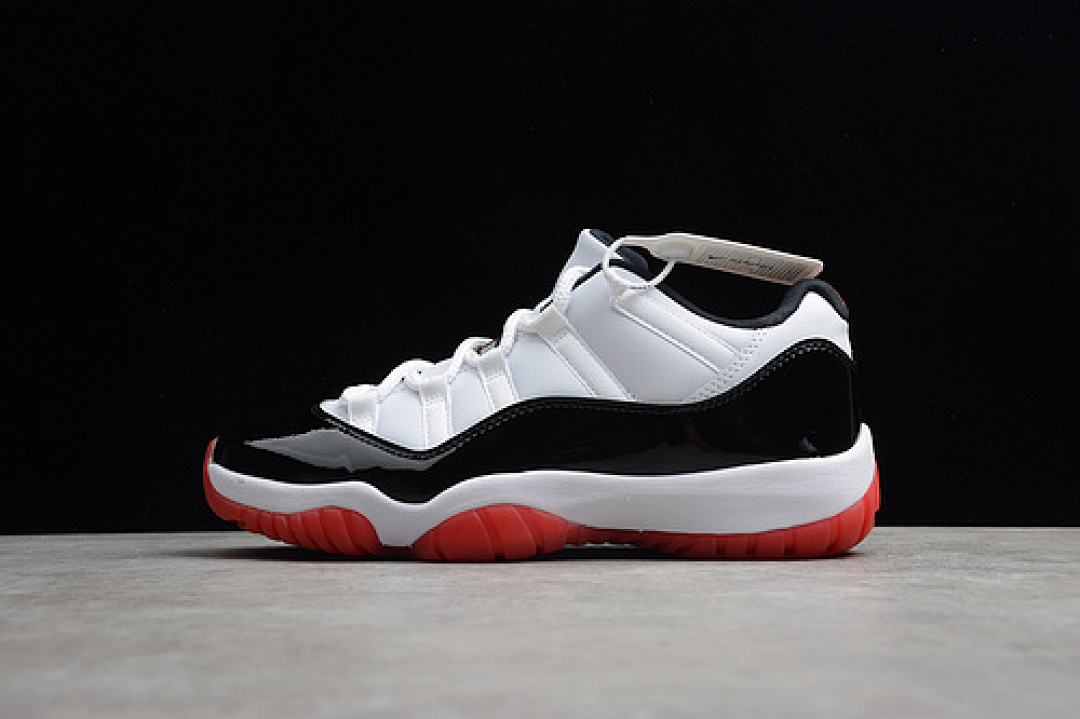 Jordan [AV2187-160]-[ST AIR JORDAN 11 LOW WHITE/UNIVERSITY RED-BLACK-TRUE RED]-[MAN:40-46], photo 1
