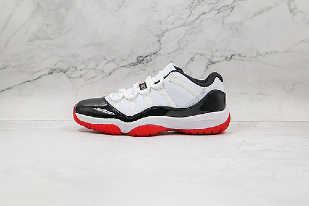 Jordan AIR Jordan 11 LOW WHITE/UNIVERSITY RED-BLACK-TRUE RED · AV2187-160, photo 1