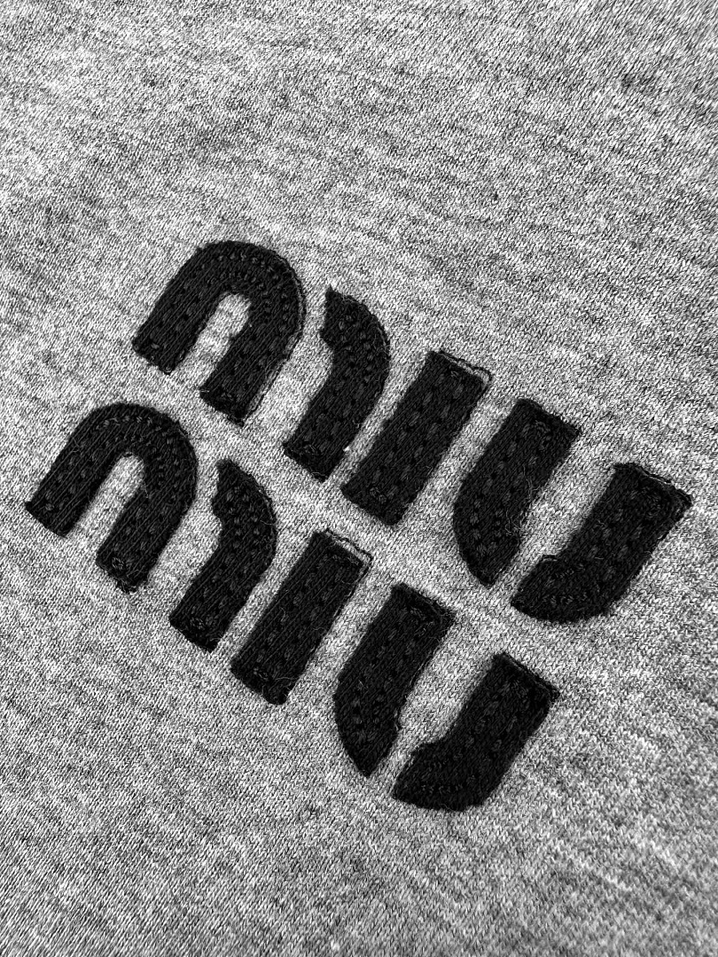Miu Miu 67015-60L - Image 8